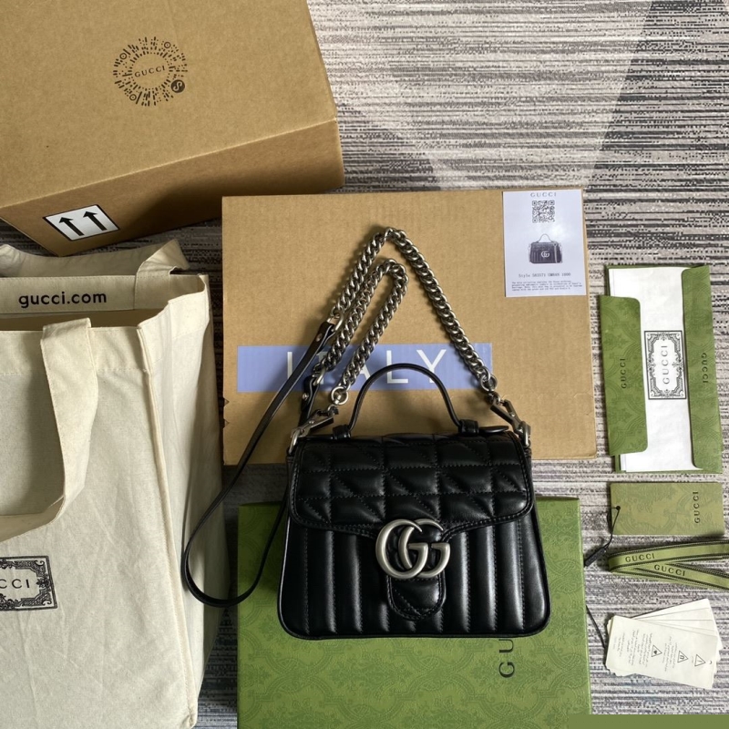 G*u*i top handle bags
